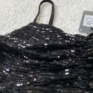 Black and shiny crop top Size XS Primark/ Top corto en color negro brillante